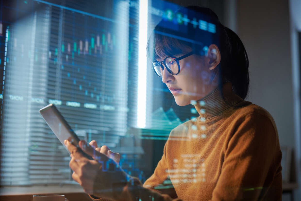 innovation-visual-revops-transformation-digital-technology-woman-working-on-tablet-with-data-reflections