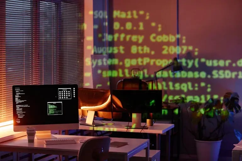 innovation-visual-revops-transformations-computer-monitor-with-data-on-screen-and-reflecting