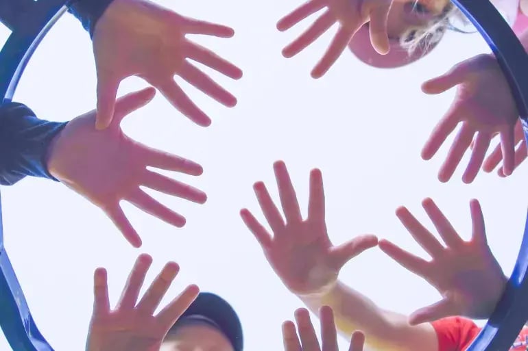 innovation-visual-revops-transformations-people-concept-childrens-hands-in-circle
