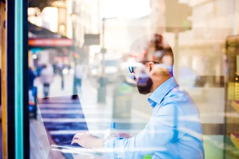 innovation-visual-revops-transformations-people-concept-man-working-at-desk