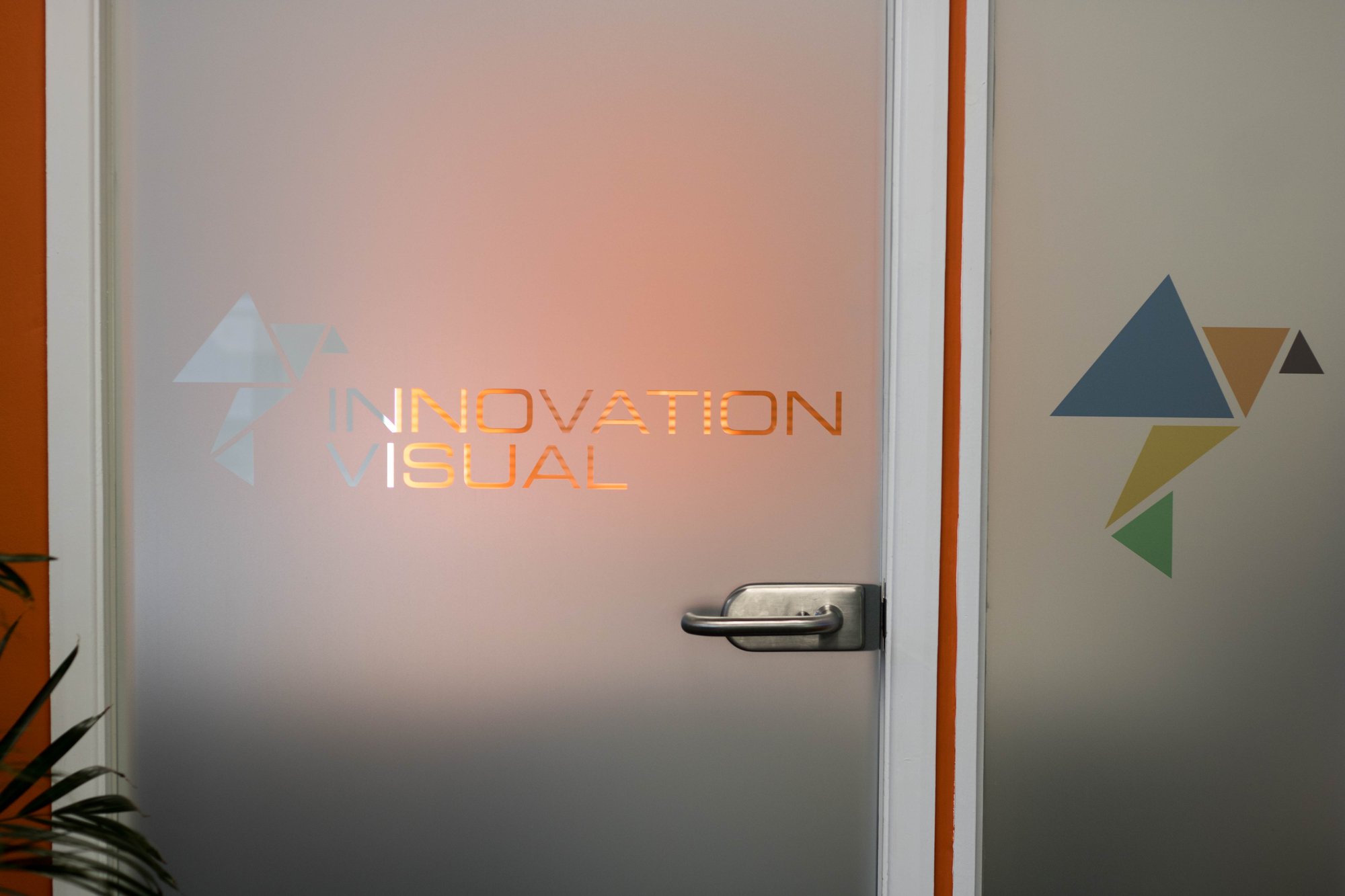 Innovation Visual's Logo on a door 