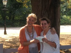 Director of Innovation Visual, Joanna Butler presenting cheque to Karen Botha 