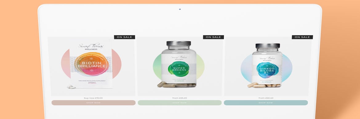 Simone Thomas Wellness products on SEO optimised Shopify website built by Innovation Visual on laptop screen
