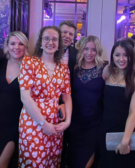The Innovation Visual team pose for a group photo at the Wildlife Ball