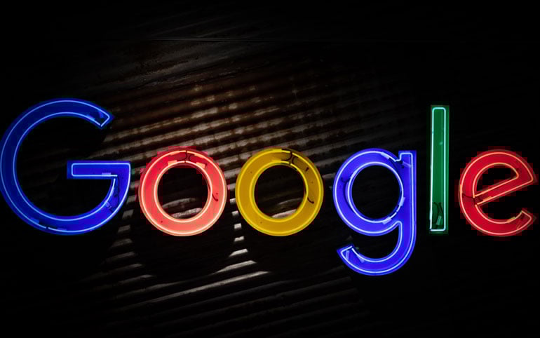 Neon Google logo on rusted metal
