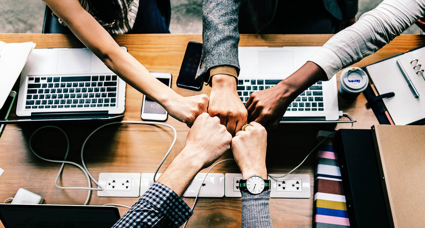 People-fist-bumping-together