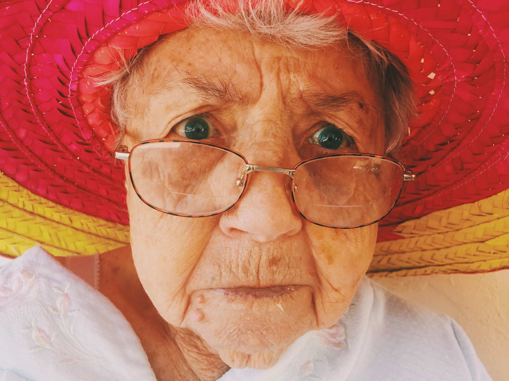 old lady with glasses and hat - a potential customer