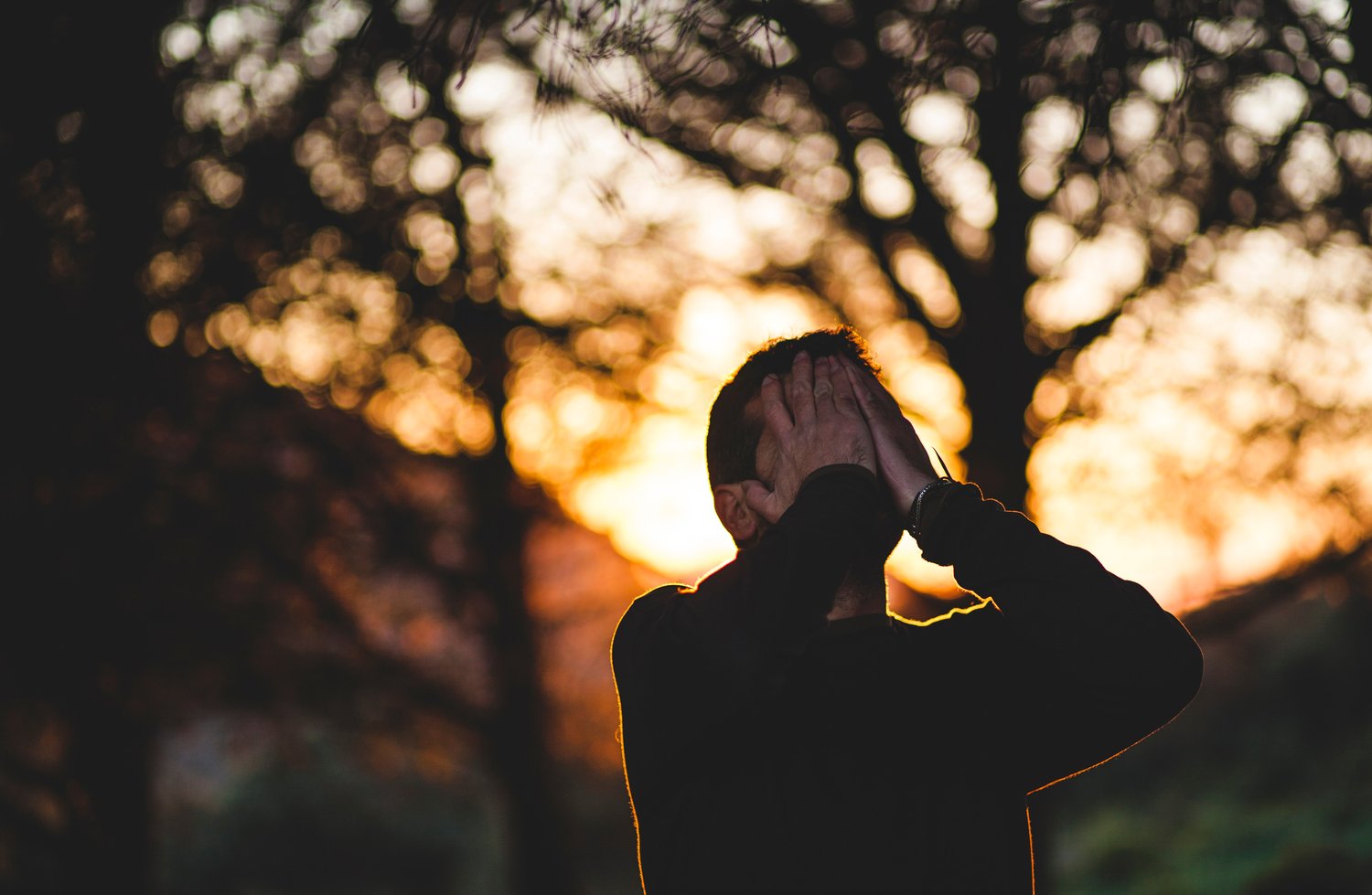 stressed man thinking about search term analysis 