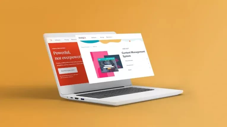 Hubspot CMS updates screen over screen out of laptop concept