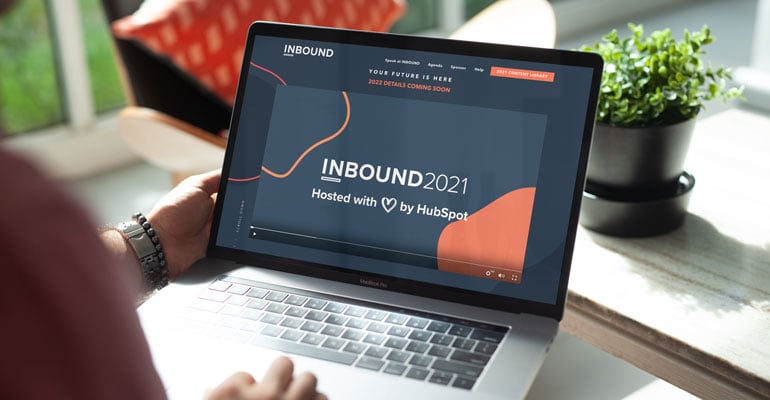Watching HubSpot's Inbound 2021 event update on a laptop.