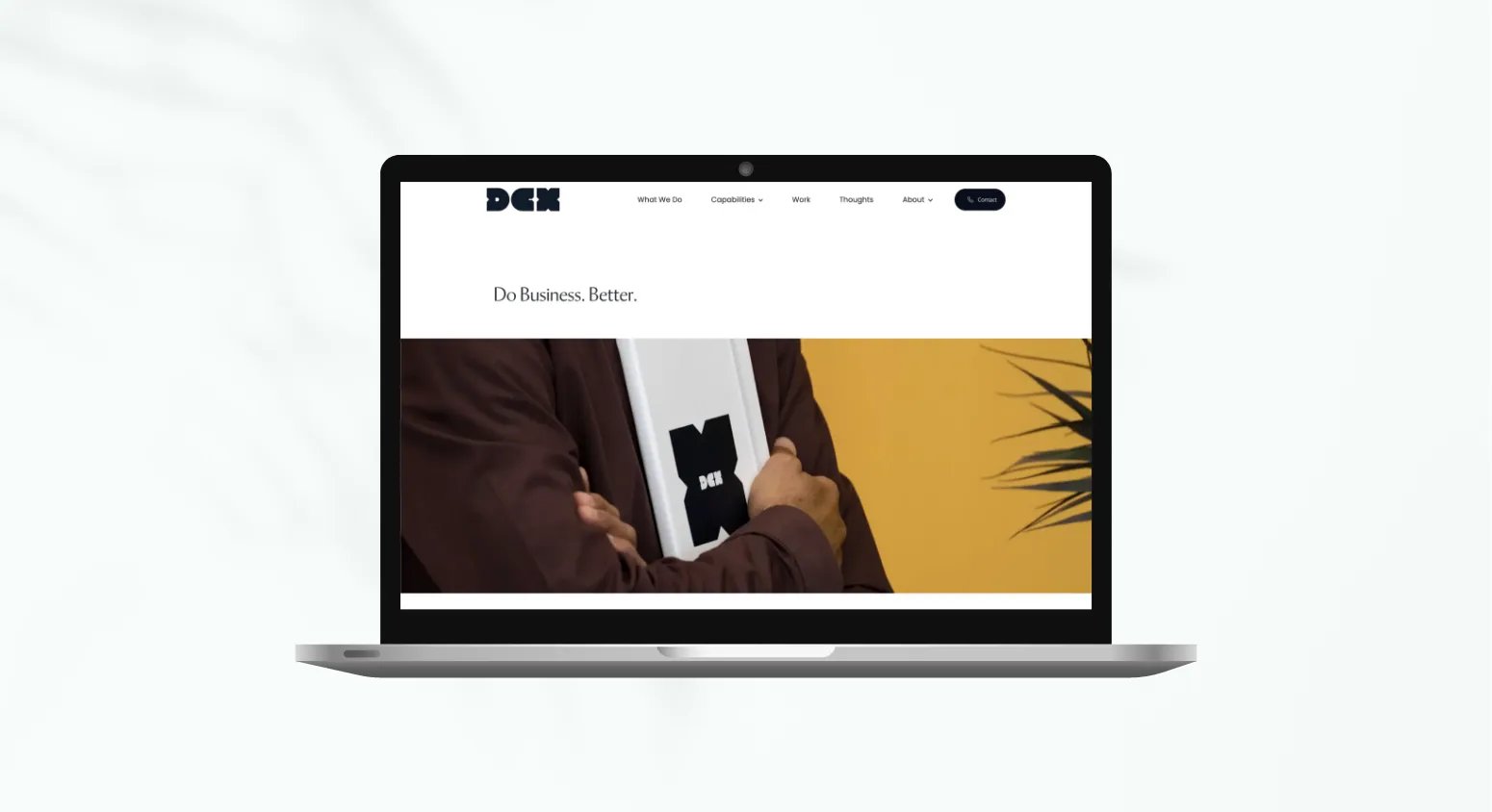 Innovation Visual web development client DCX's website on laptop screen