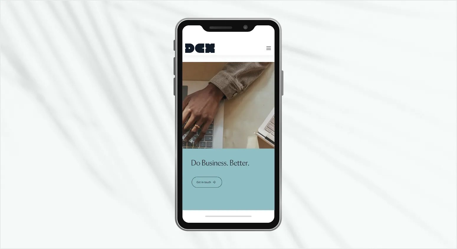 Innovation Visual web development client DCX's website on mobile screen