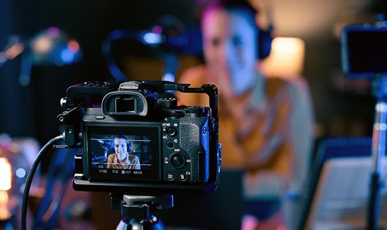 vlogger producing video content to increase views on YouTube channel