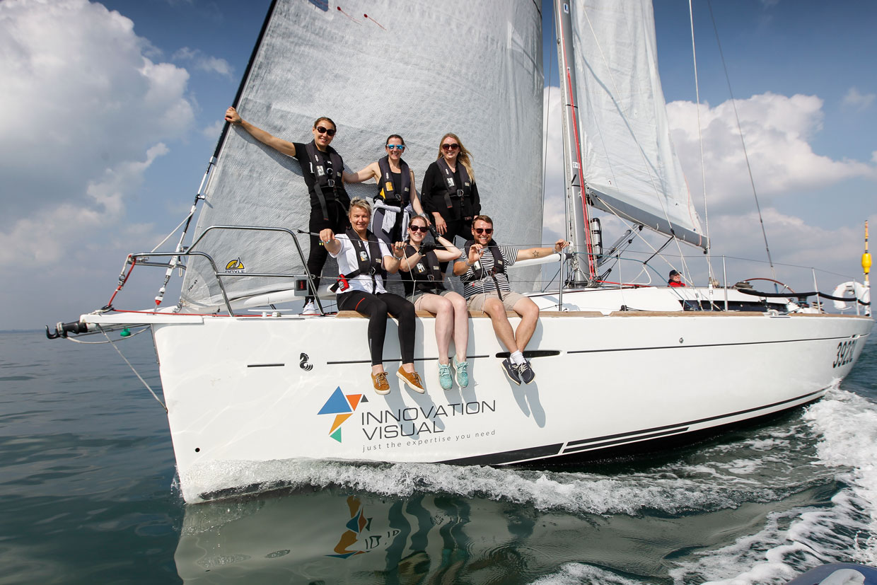 6 members of the Innovation Visual digital marketing team sailing on IV branded yacht