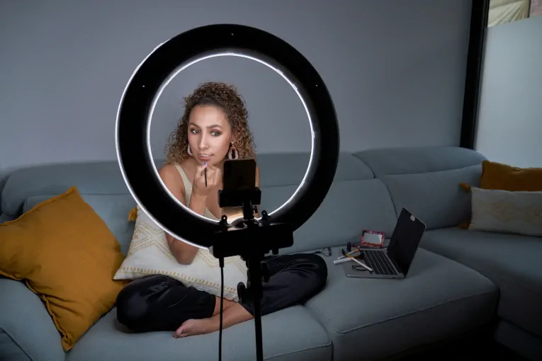 woman recording short-form video make-up marketing