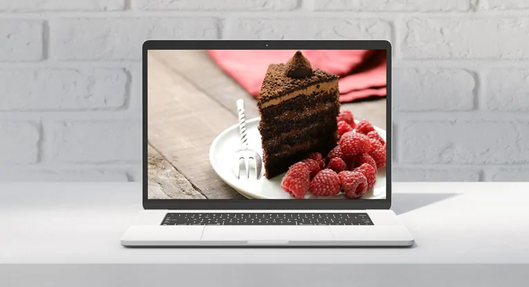 chocolate cake appealing content concept on laptop screen